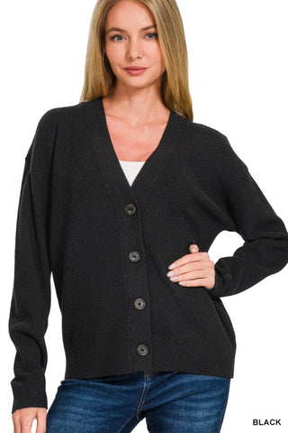 Woman wearing a black cardigan