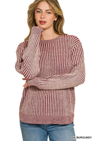 Woman wearing a two toned sweater