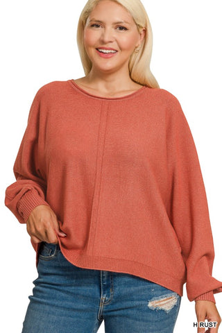 Model wearing a rust colored sweater