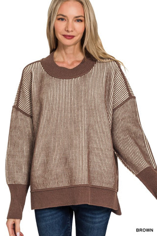 Woman modeling a brown striped sweater