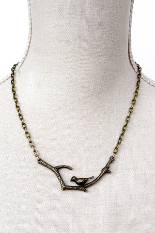 Bird on a branch necklace