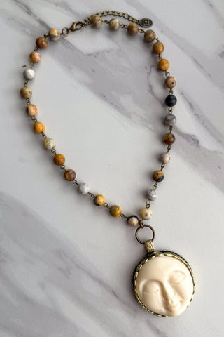 Beaded necklace with moon pendant