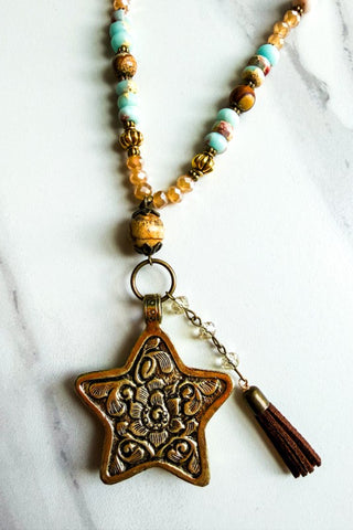 Florette pendant on a beaded chain