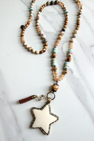Beaded necklace with a star shaped pendant