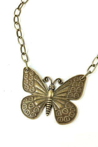Butterfly pendant on a bronze chain