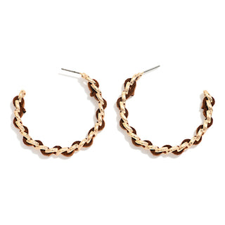 A pair of gold and brown chain-link hoop earrings on a plain white background.