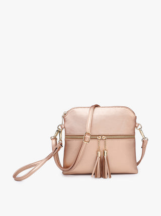 Beige handbag with a tassel on a white background