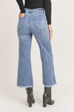 Back of high waisted, frayed bottom, ankle jeans