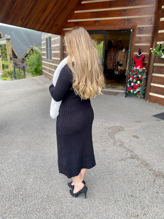 Back of black sweater dress