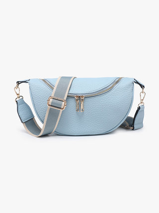 Light blue crossbody bag with a strap on a white background