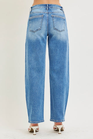 Blue jeans on a plain background