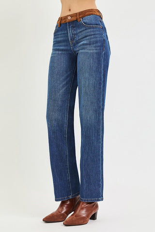 Woman wearing brown boots and jeans