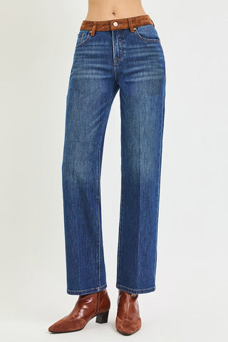 Woman wearing brown boots and jeans