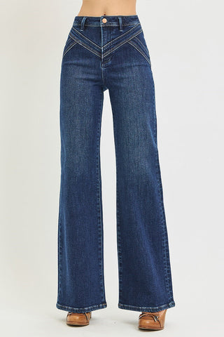 woman wearing jeans and brown shoes