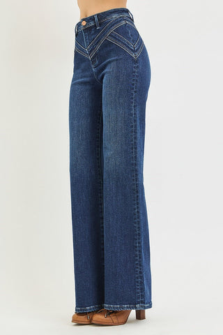 woman wearing jeans and brown shoes