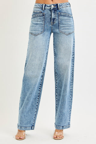 Woman wearing jeans on a white background