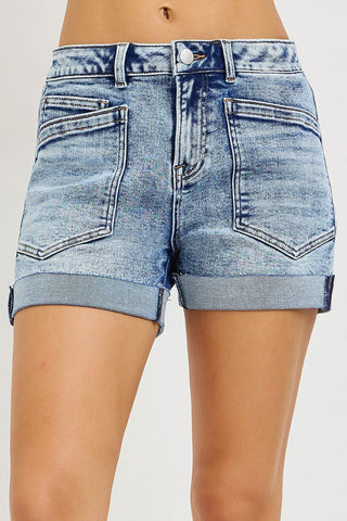 Blue denim shorts on a white background