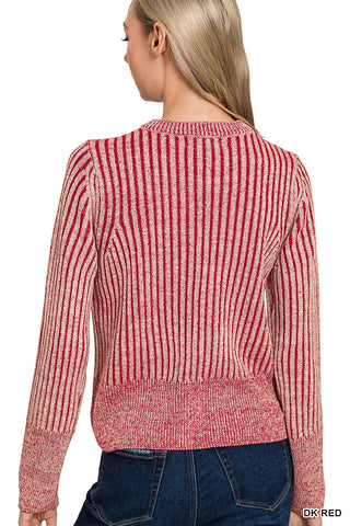 Back of a woman wearing a red striped sweater